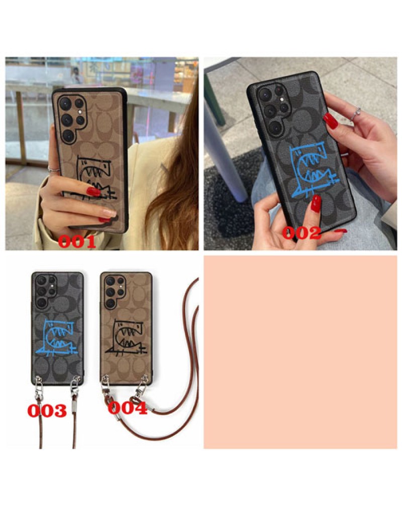 coach galaxy s24/s23 ultra/A54ケースコーチアイフォン16pro/15pro/14pro保護ケース個性落書き iphone14 pro max/13 pro maxケース欧米風iphone12proカバーコーチgalaxy s22 ultra/s21/note20 ultraケースショルダー携帯便利